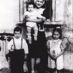 Concha-Corral,-Mom's-Cousin-holding-Rudy-with-Al-&-Betty-at-her-side,-Monterrey,-Mx.