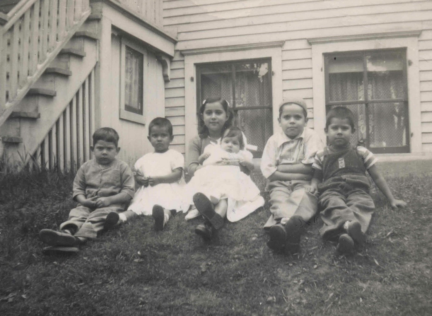 Rudy (from left), Espe, Betty, Mary, Al Jr, and Joe Villasenor. First house on 6th St. Milwaukee, year1949